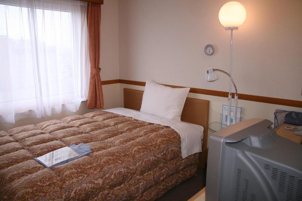 Toyoko Inn Hirosaki Ekimae Rum bild